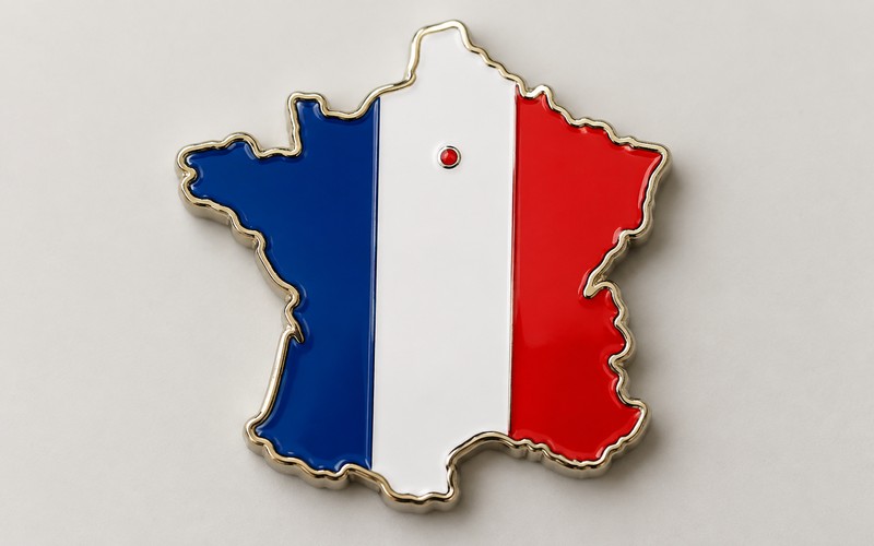 AI-generated product concept of a France-shaped tricolor refrigerator magnet marking Paris.