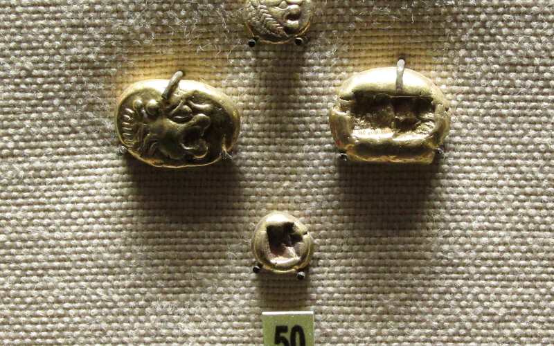 what is the oldest coin in the world cover