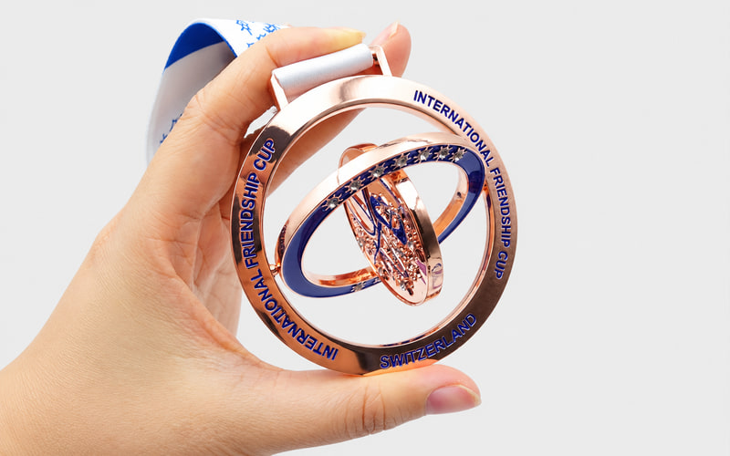 Custom spinner medals with rotating center