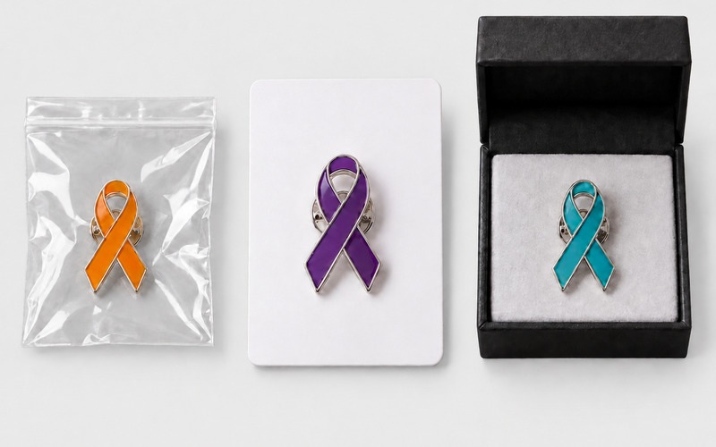 Lapel pin packaging options with polybag, backing card and presentation box
